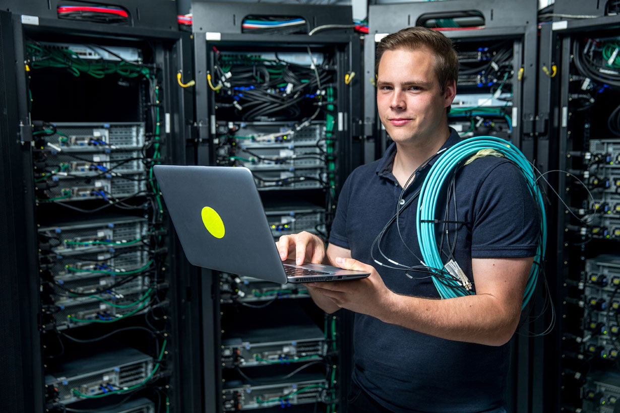 Man at work in a server room