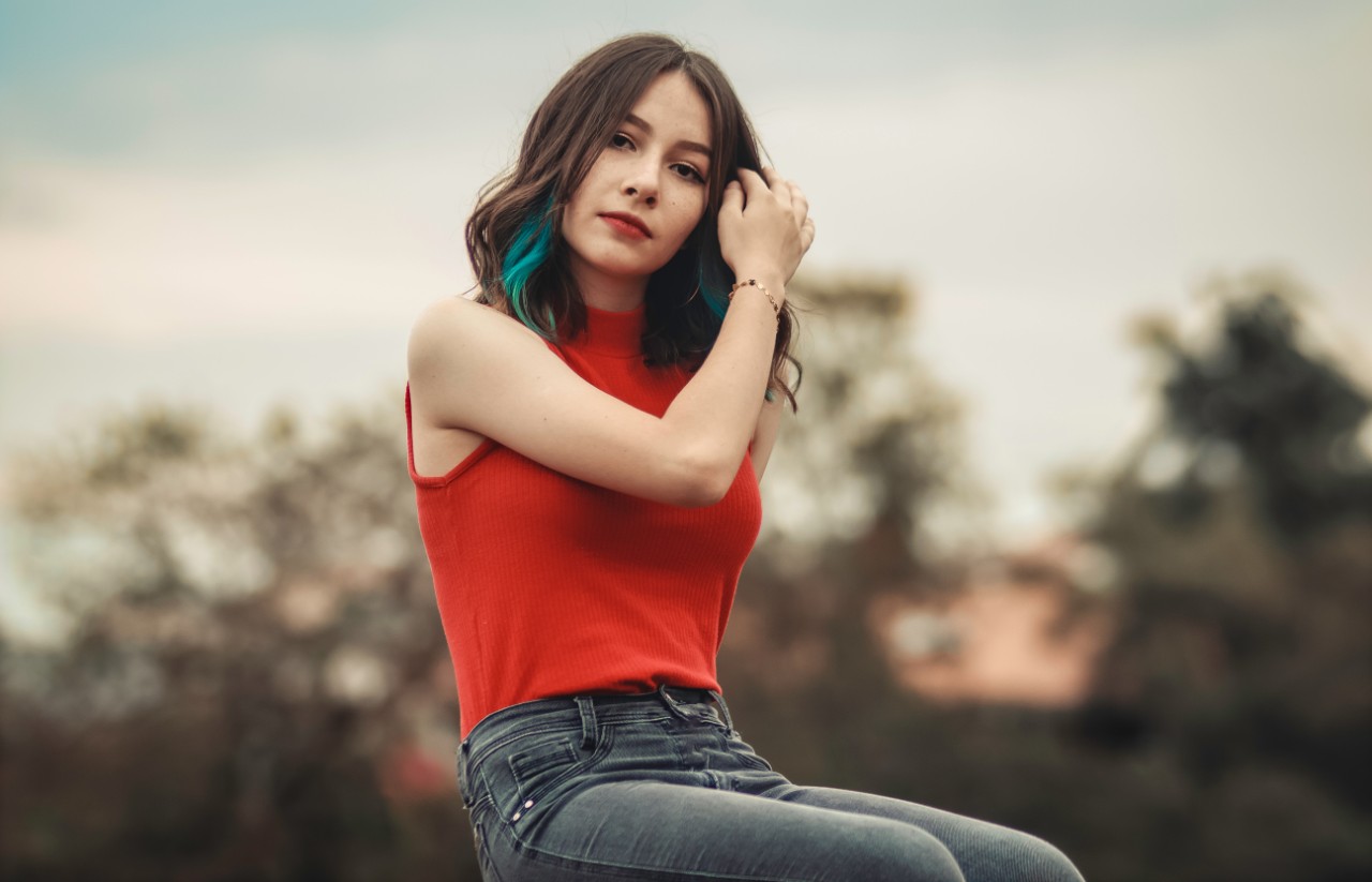 Young woman sitting outside