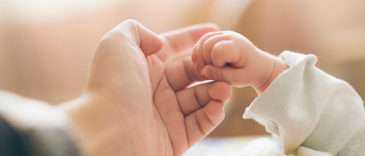 Mum and baby's hands