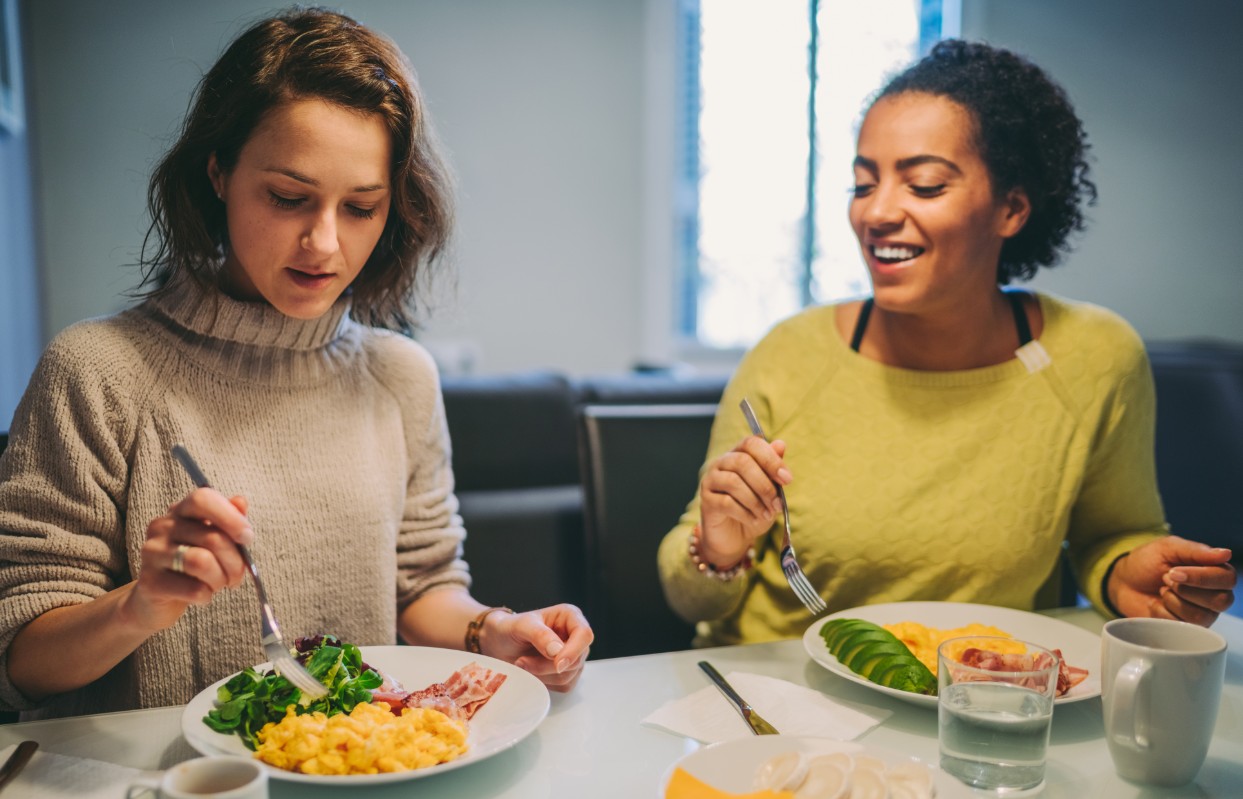 2 girls eating a keto meal