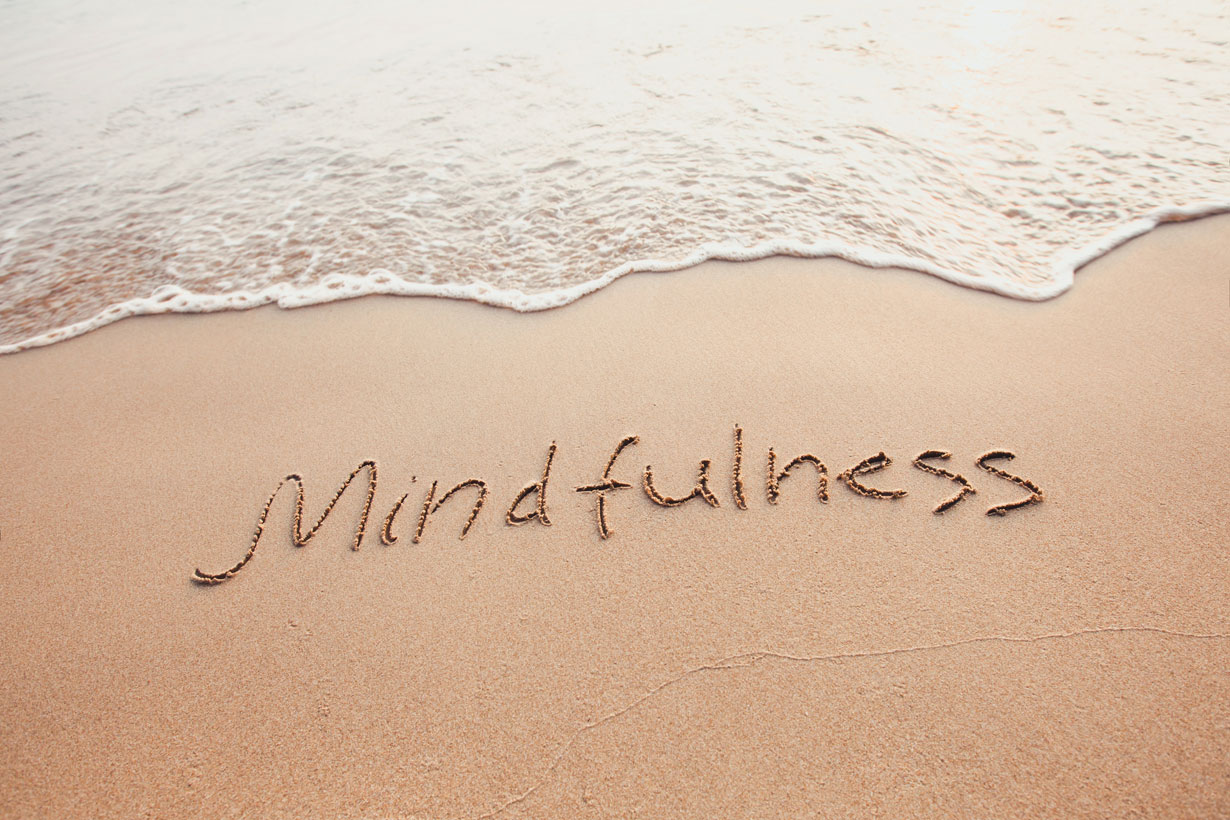 Mindfulness drawn into the sand