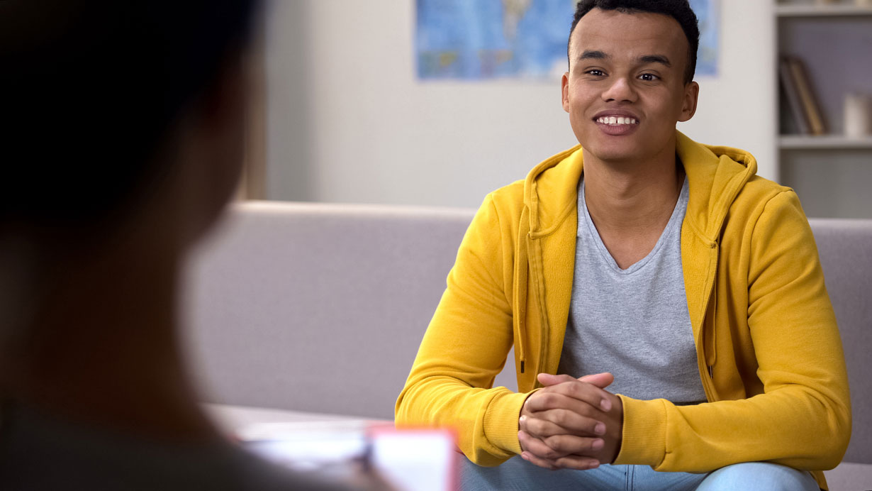 Man talking to a counsellor