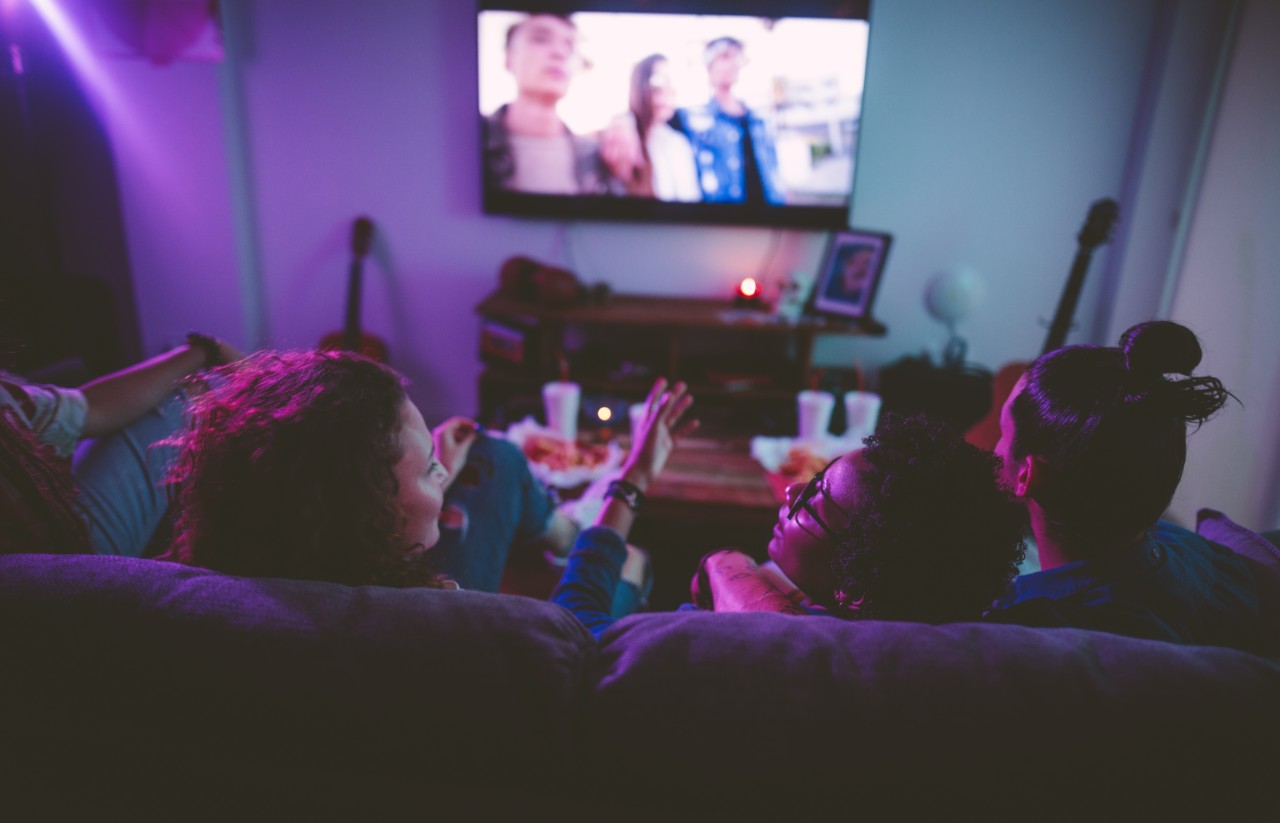 Flatmates watching TV